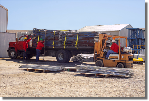 INI workers unloading truck
